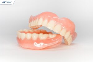 Trồng răng số 6 bằng hàm tháo lắp nhựa